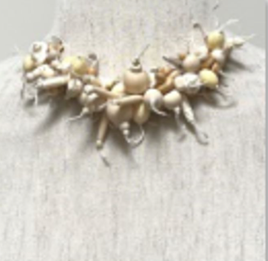 Anneke Dekker - Multi strand necklace with natural bone and wood