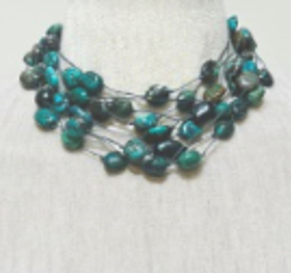 Anneke Dekker - Multi strand necklace with natural turquoise