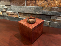 Dale Nichols and Sharon Meyers - Leopard wood box with ceramic flower adornment