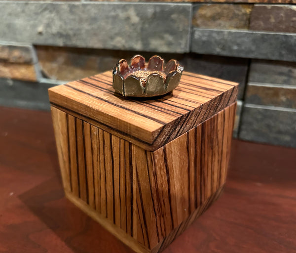 Dale Nichols and Sharon Meyers - Zebra wood box with ceramic flower adornment