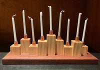 Dale Nichols - Hanukkah menorah on platform